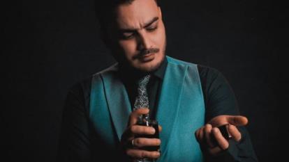 دانلود آهنگ جدید کامران مولایی به نام عطر