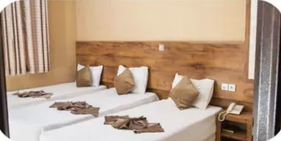 اتاق سه نفره_هتل بیستون