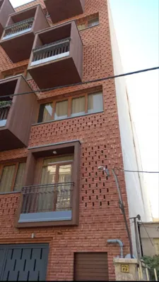 بازسازی نمای آجری