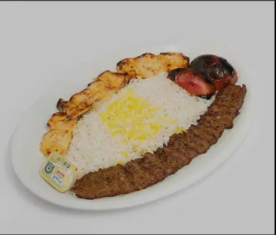 چلو وزیری_3,300,000ریال توضیحات : یک سیخ کوبیده گوشت 95 گرمی_ یک سیخ جوجه 200 گرمی_ برنج 380 گرم _ دورچین کامل